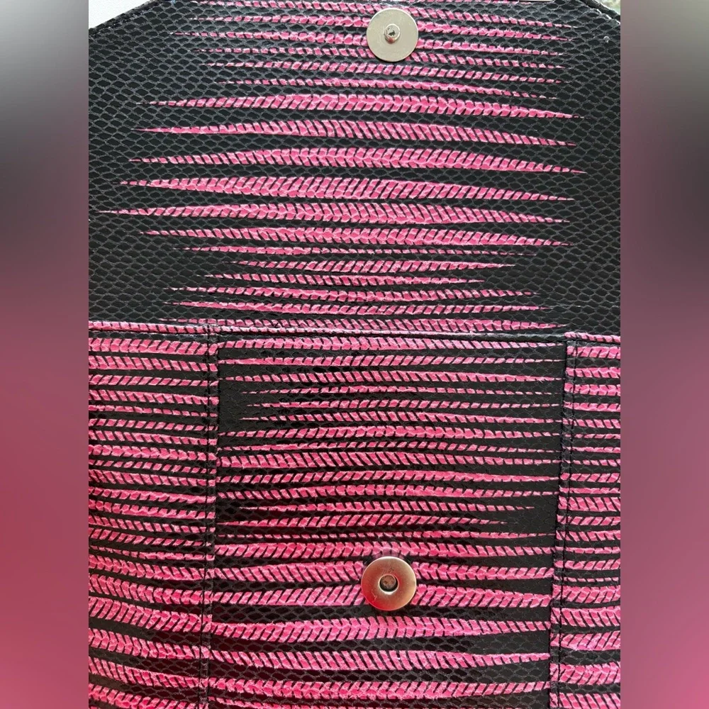 BCBGMaxazria Pink & Black Striped Clutch inside pockets with zipper. Very soft